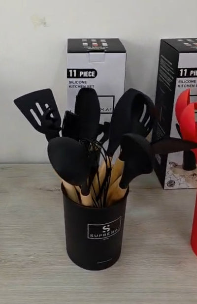 Nuovissimo Scarico..
Set 11 pz  Utensili da Cucina In Silicone Antiaderente con Manico in Legno